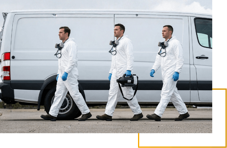 3 biohazard technicians walking together to perform service