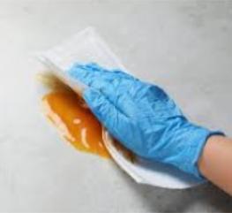 cleaning up a spill gloves
